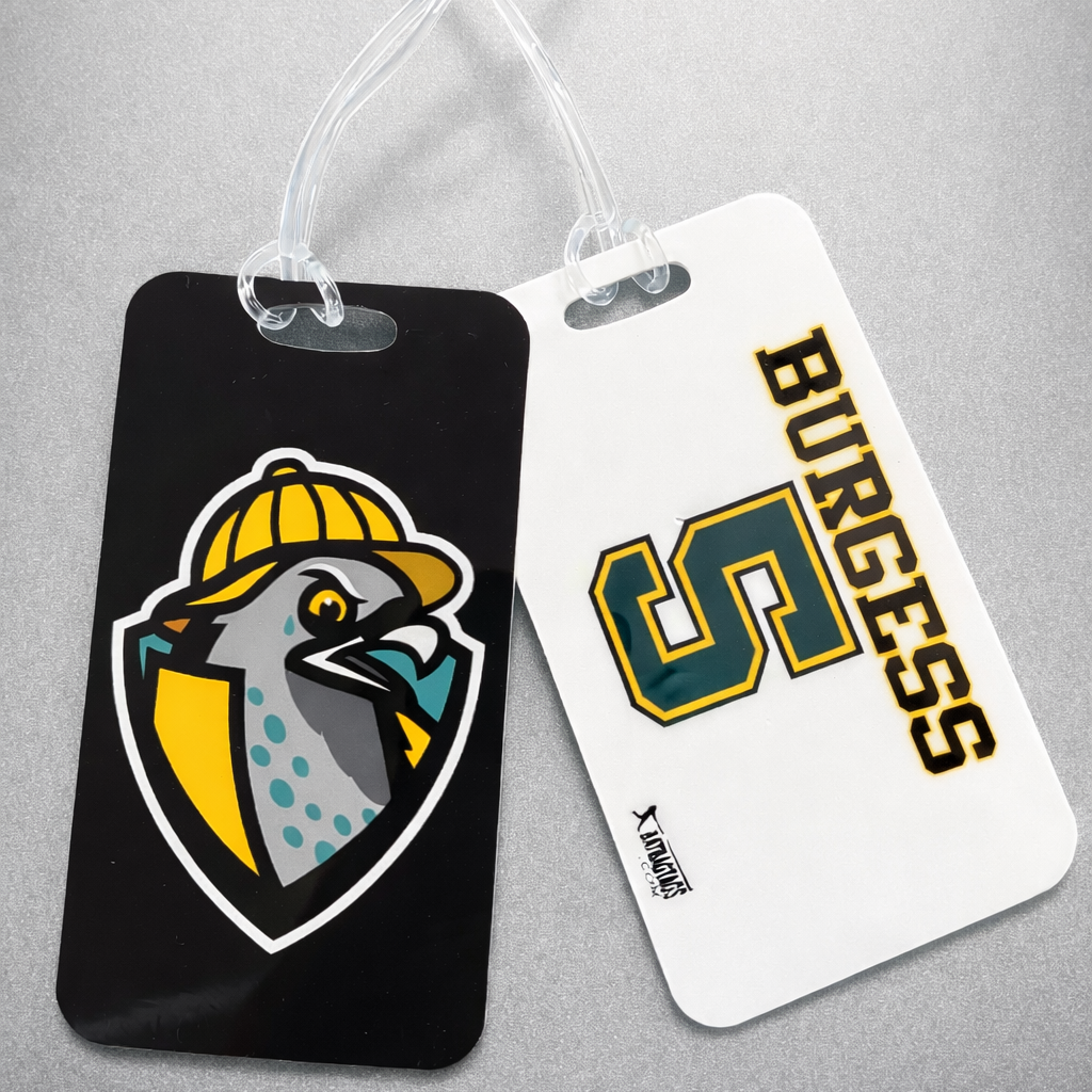 Two luggage tags with a logo and text on a gray background